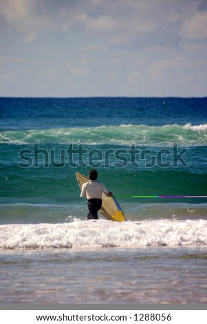Surfer with surfing board