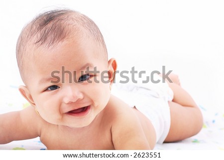 images of babies laughing. aby laughing over white