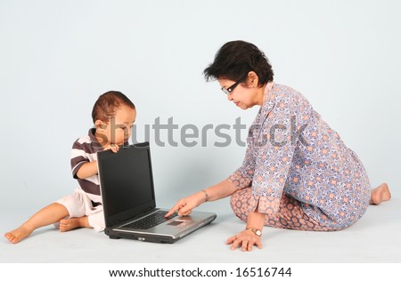 Learn how to use a laptop computer with grandma