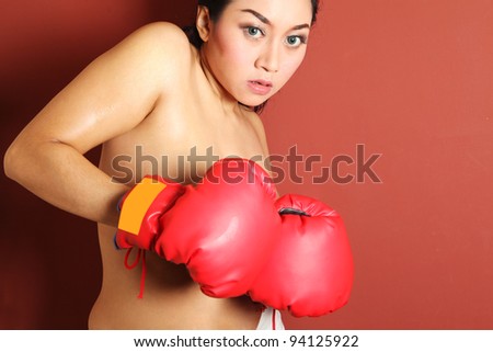 Hot asian woman with boxing gloves