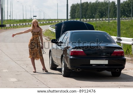 The woman asks to help with the broken car.