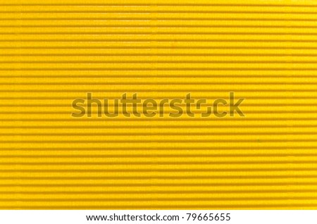 yellow corrugated cardboard texture. Closeup.