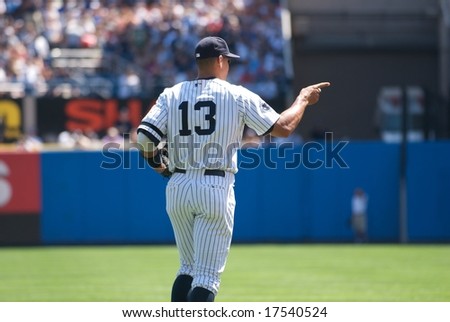 NEW YORK: AUGUST 17 - Alex Rodriguez runs on to the field at a game at Yankee Stadium on August 17, 2008.