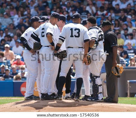 NEW YORK: AUGUST 17 - A Yankee team talk on the mound at Yankee Stadium on August 17, 2008.