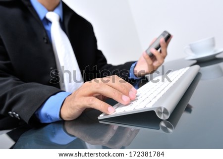 businessman working with computer and mobile