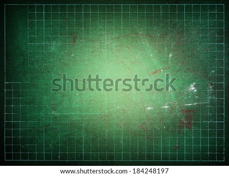 used green cutting mat on white background