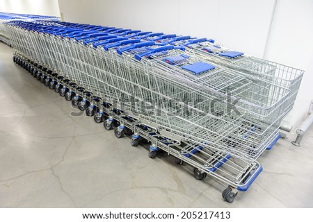 abstract shopping carts at parking lot