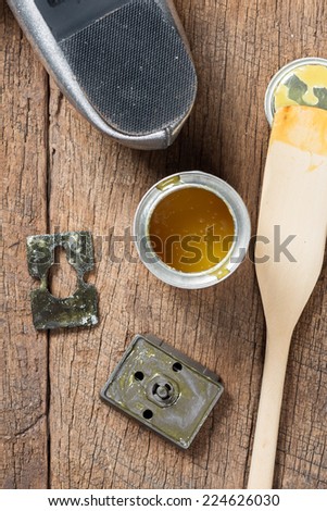 closeup rubber adhesive on wooden desk