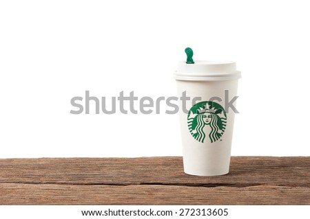 BANGKOK, THAILAND - APRIL 25, 2015: White paper cup with Starbucks logo. Starbucks is the world\'s largest coffee house with over 20,000 stores in 61 countries.