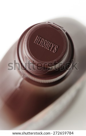 BANGKOK, THAILAND - APRIL 26, 2015: Closeup Logo of Hershey\'s on plastic cap of Hershey\'s Chocolate Syrup bottle. The Hershey Company is the largest chocolate manufacturer.