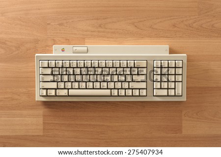 BANGKOK, THAILAND - MAY 05, 2015: The Apple Keyboard II on desktop. A minor update to the Apple Extended Keyboard to coincide with the release of the Macintosh IIsi in 1990.