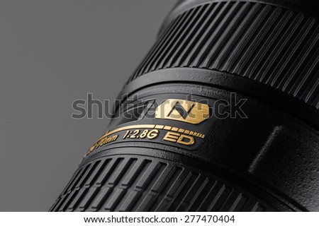 BANGKOK, THAILAND - MAY 13, 2015: N logo on name plate of Nikon Lens, lens with Nano Crystal Coat feature. The technology is effective in reducing ghost and flare peculiar to ultra-wideangle lenses.
