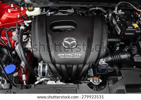 BANGKOK, THAILAND - MAY 20, 2015: Engine of All New Mazda 2 with SKYACTIV Technology. SKYACTIV is a brand name of technologies developed by Mazda which increase fuel efficiency and engine output.