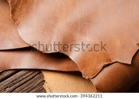 leather working, closeup details of brown leather