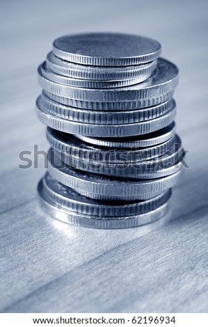close up column of nickel coins in metal look