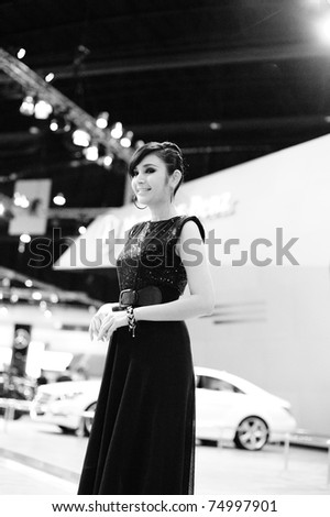 NONTHABURI, THAILAND - MARCH 26: Unidentified female presenter at Mercedes Benz booth  in the 32nd Bangkok International Motor Show on March 26, 2011 in Nonthaburi, Thailand.