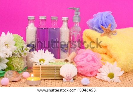 Bath and Spa Products with flowers on Pink Background