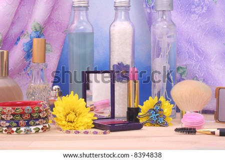 Cosmetics and Jewelry With Flowers and Perfume