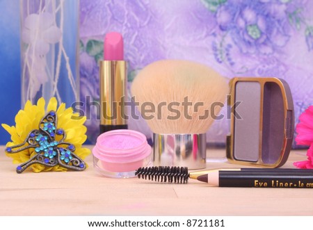Jewelry and Cosmetics with Flowers on Vanity