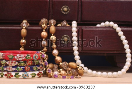 Vintage Jewelry and Open Jewelry Box on Table