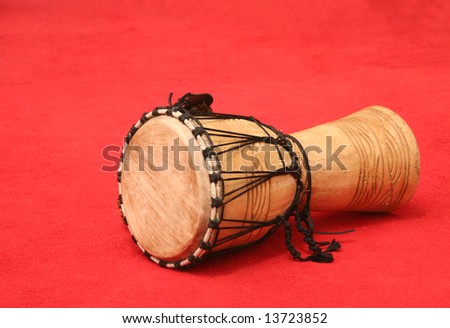 Old Drum on Red Carpet Laying on Side