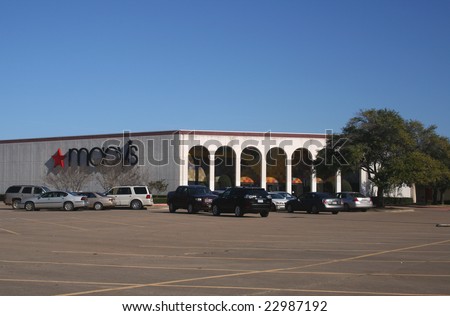 TYLER, TX - JAN 8: Cars lie parked near a Macy’s store on January 8, 2009 in Tyler, Texas. Reports state that Macy’s Inc may close 11 underperforming stores in approximately nine states.