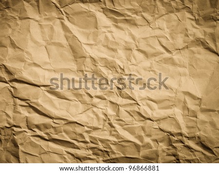Dark crumpled page of vintage paper texture