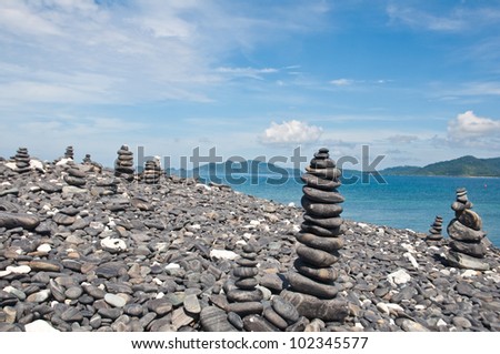 Tower of rocks on the rock beach,Thailand