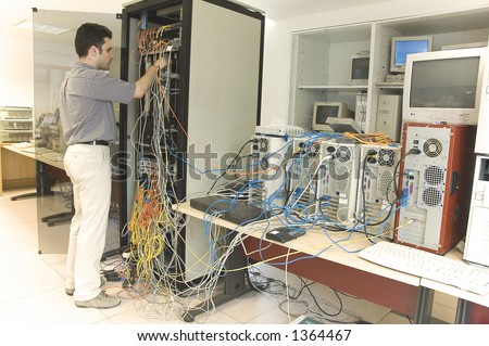 Engineer Working on Switch Cabinet