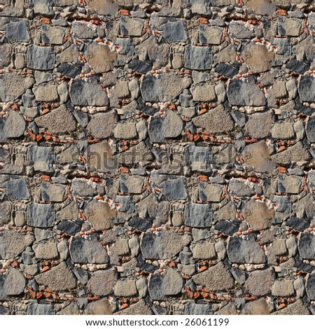 Seamless tile pattern of stone wall. You can create an arbitrary image size by simply concatenating several of these images together. Each edge of this image matches with the opposite edge.