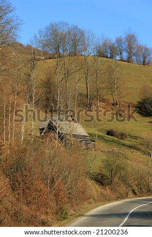 nice log cabin in a mountain landscape