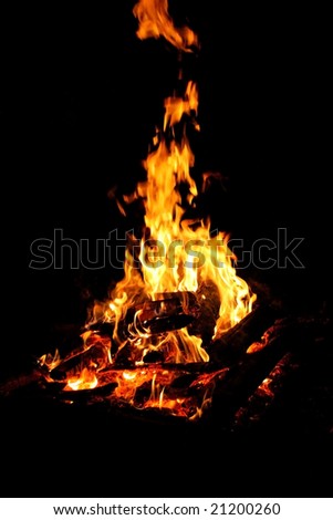 camp fire in the night with great flames