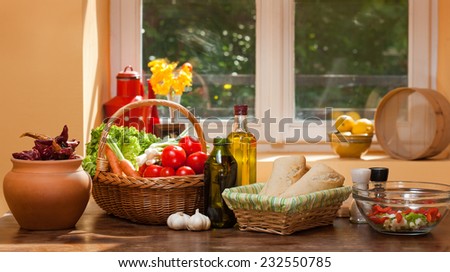 Assortment of fresh healthy groceries on display in the kitchen.