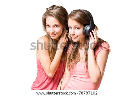 stock photo Teen radio two gorgeous cute brunette teen girls having fun 