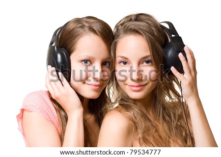 stock photo Teen radio two gorgeous cute brunette teen girls having fun 