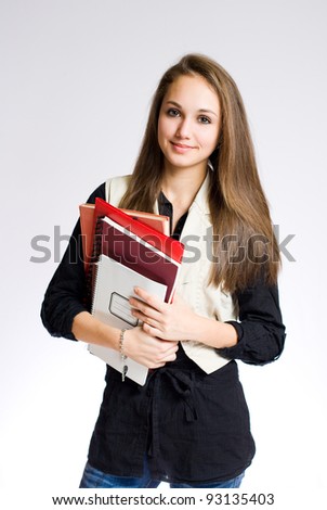 Portrait of a gorgeous brunette high school student girl.