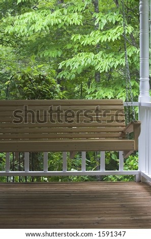 Wood Porch Swing in a wooded setting