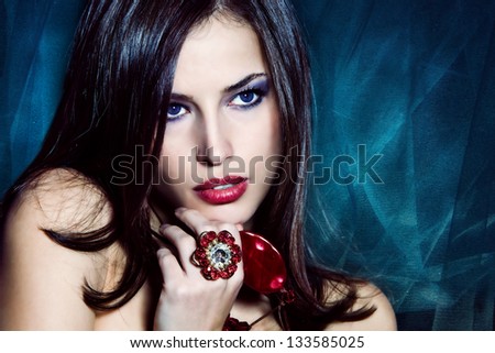 beautiful brunette woman with jewelry