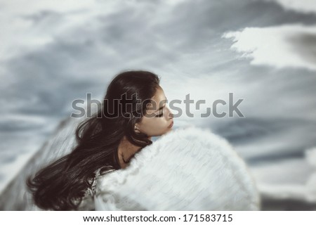 fantasy angel woman with sky in background