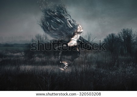attractive young woman dancing long hair fly, double exposure