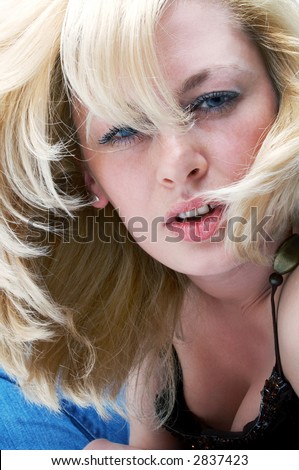 portrait of blond woman - flying hair