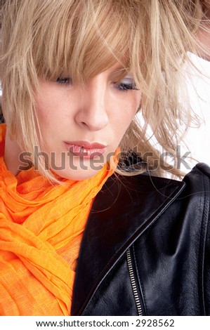 blond girl in leather jacket and