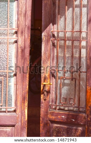 old wooden door, half opened
