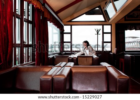 alone woman sitting in restaurant