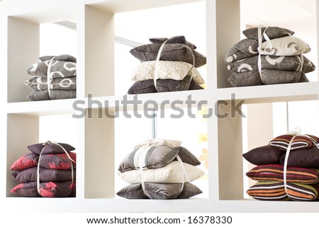 decorative pillows on a white shell