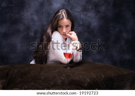 alone woman with wine glass on the table