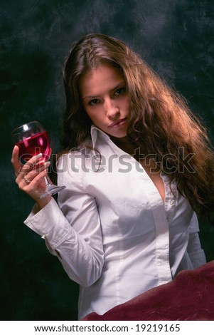 woman with wine glass in hand