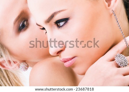 couple of beautiful women face to face