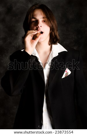 young man with cigar and queen hearts in his pocket