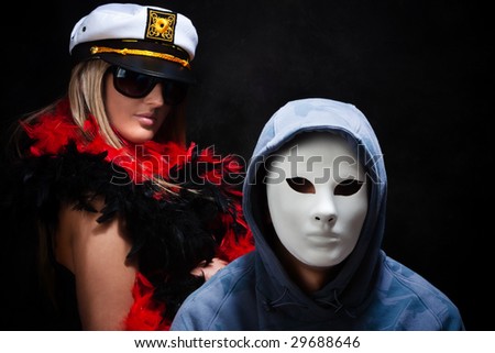 strange couple with fanny masks, studio dark